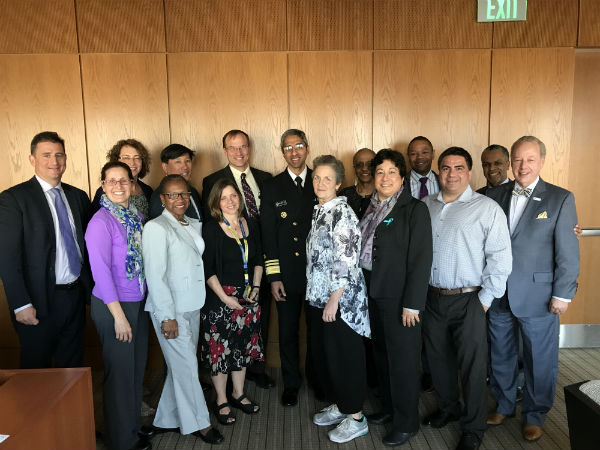 Photograph of Surgeon General Dr. Vivek Murthy with Dornsife faculty